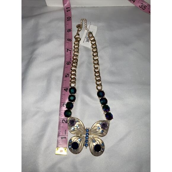 Betsey Johnson Gold Tone Blue/Purple & Iridescent Rhinestone Butterfly Necklace - Picture 6 of 8